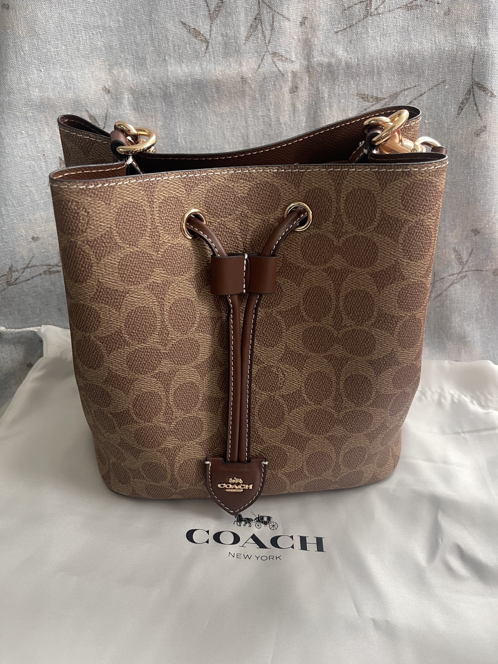 Coach Brown Signature Canvas Drawstring Bucket Shoulder Bag